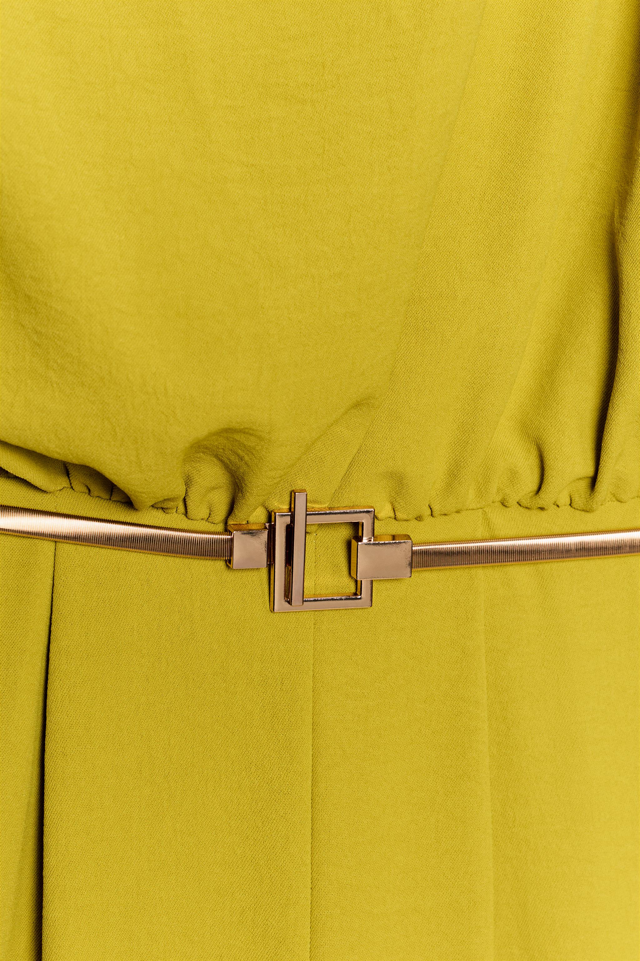 ASYMMETRIC SLEEVE BELTED JUMPSUIT